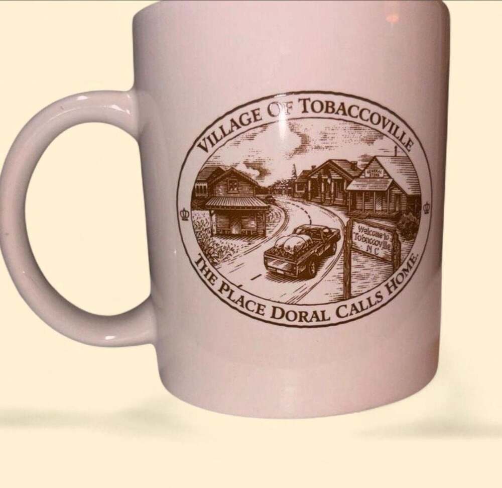Vintage Village of Tobaccoville The Place Doral Calls Home Coffee Mug